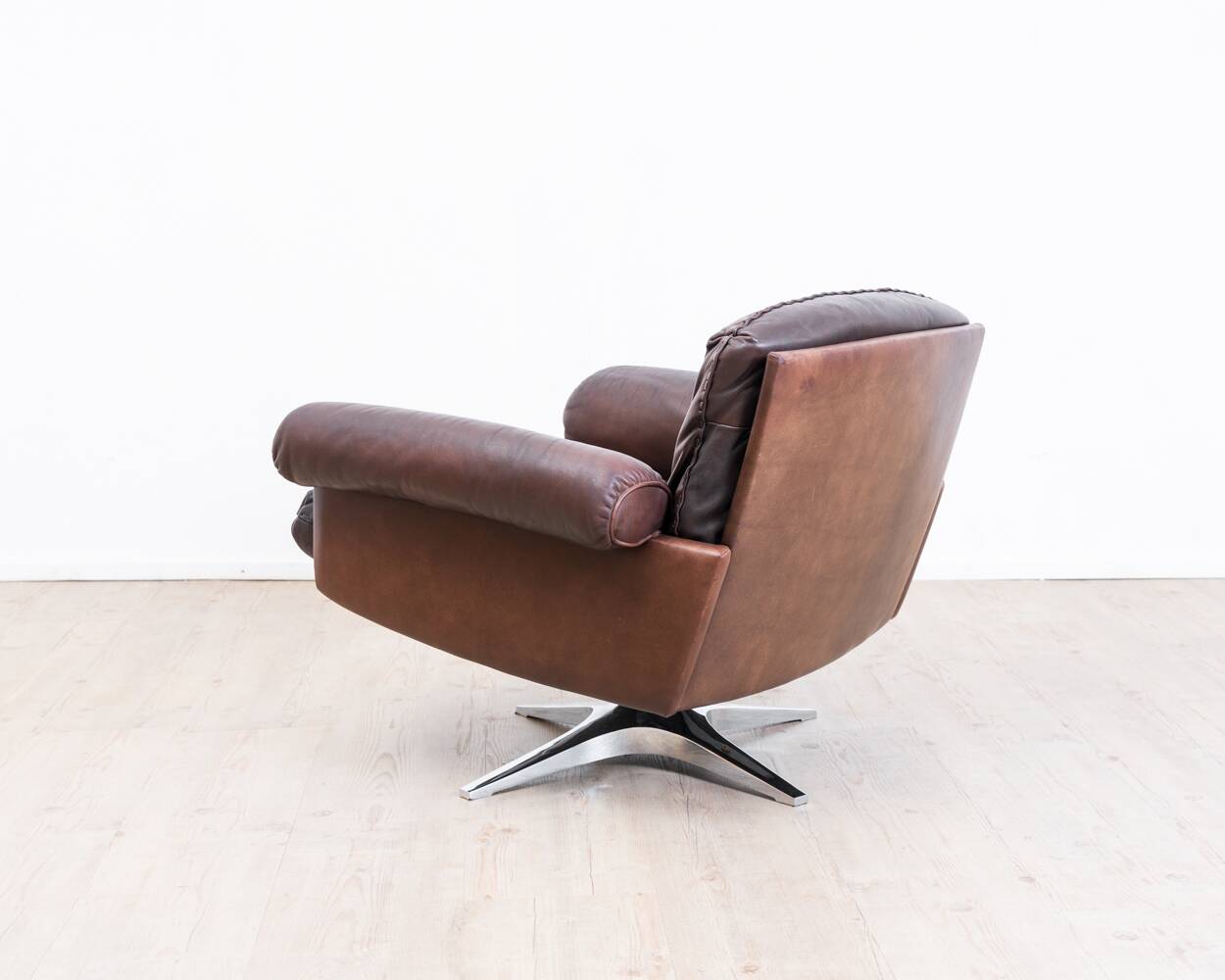 Brown leather swivel armchair by De Sede, model DS 31, 1960s, wine.