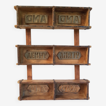 Wall shelf in wooden brick molds