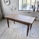 Solid oak farmhouse table with integrated extensions 1950