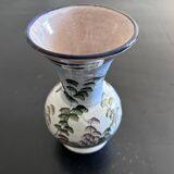 White vase with plant decoration