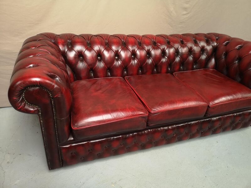 Red chesterfield sofa three seats