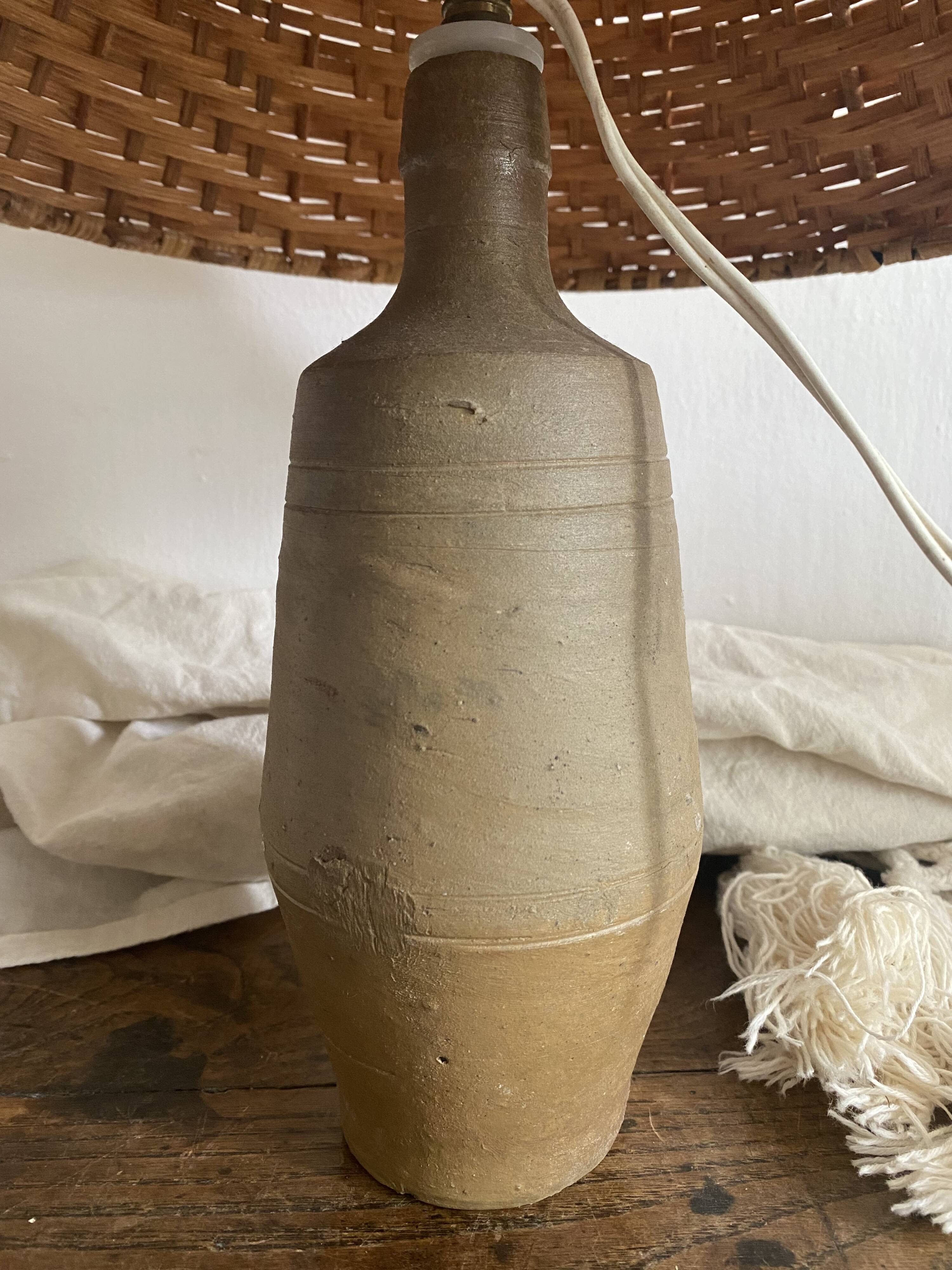 Terracotta and rattan lamp