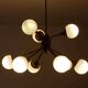 Impressive brass chandelier with opaline globes, Italy 1960s