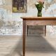 Vintage farmhouse table with spindle legs.
