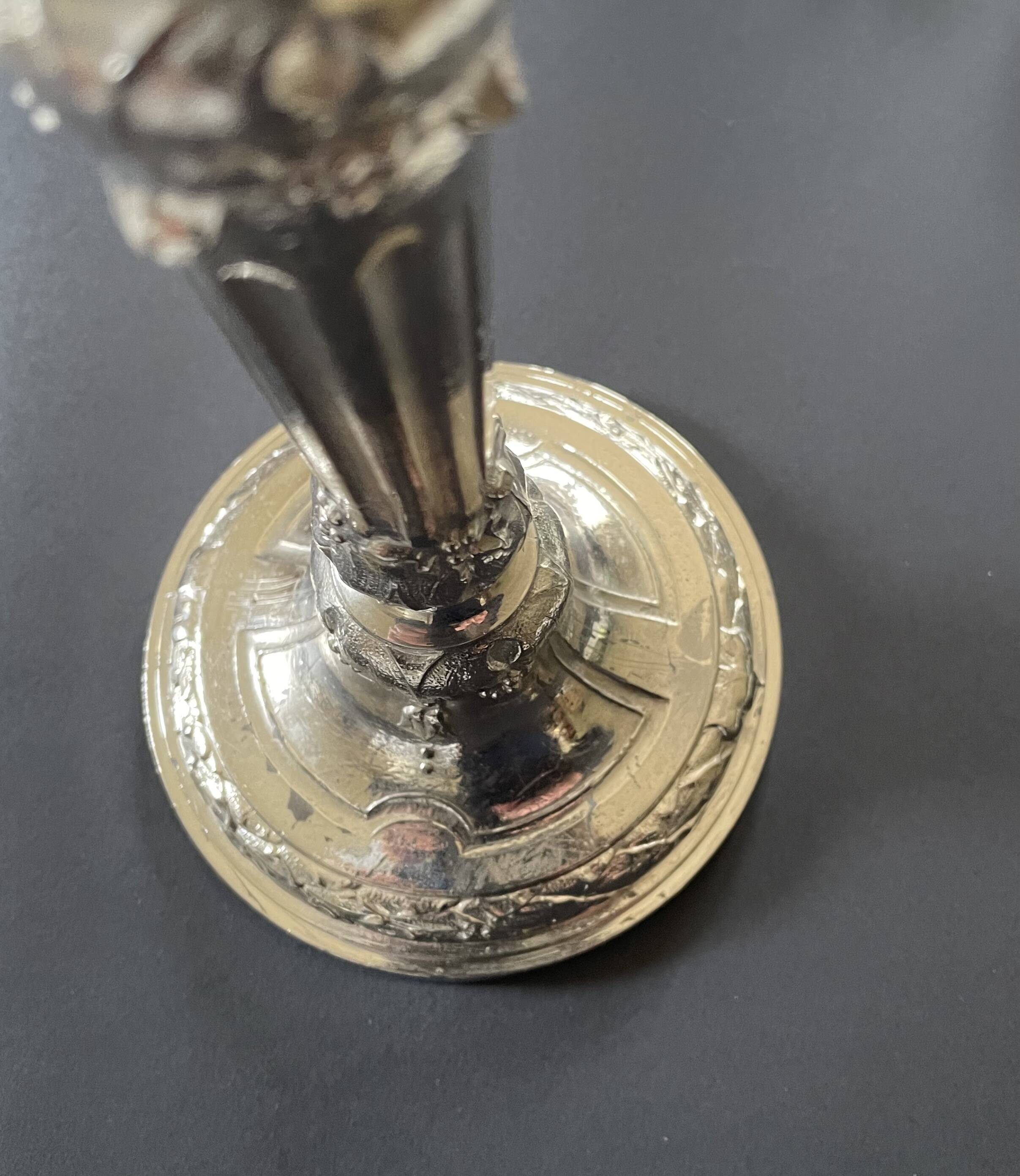 Antique silver-plated candlesticks in classic style