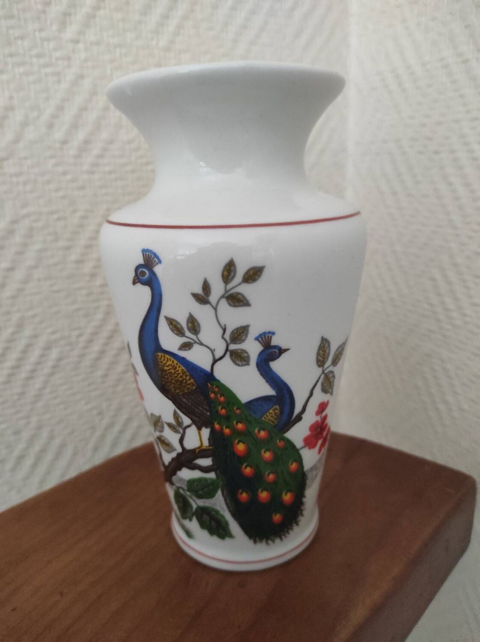 Porcelain vase with peacock decoration
