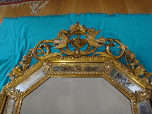 Miroir à pareclose doré fin XIX ème 130cmx85cm