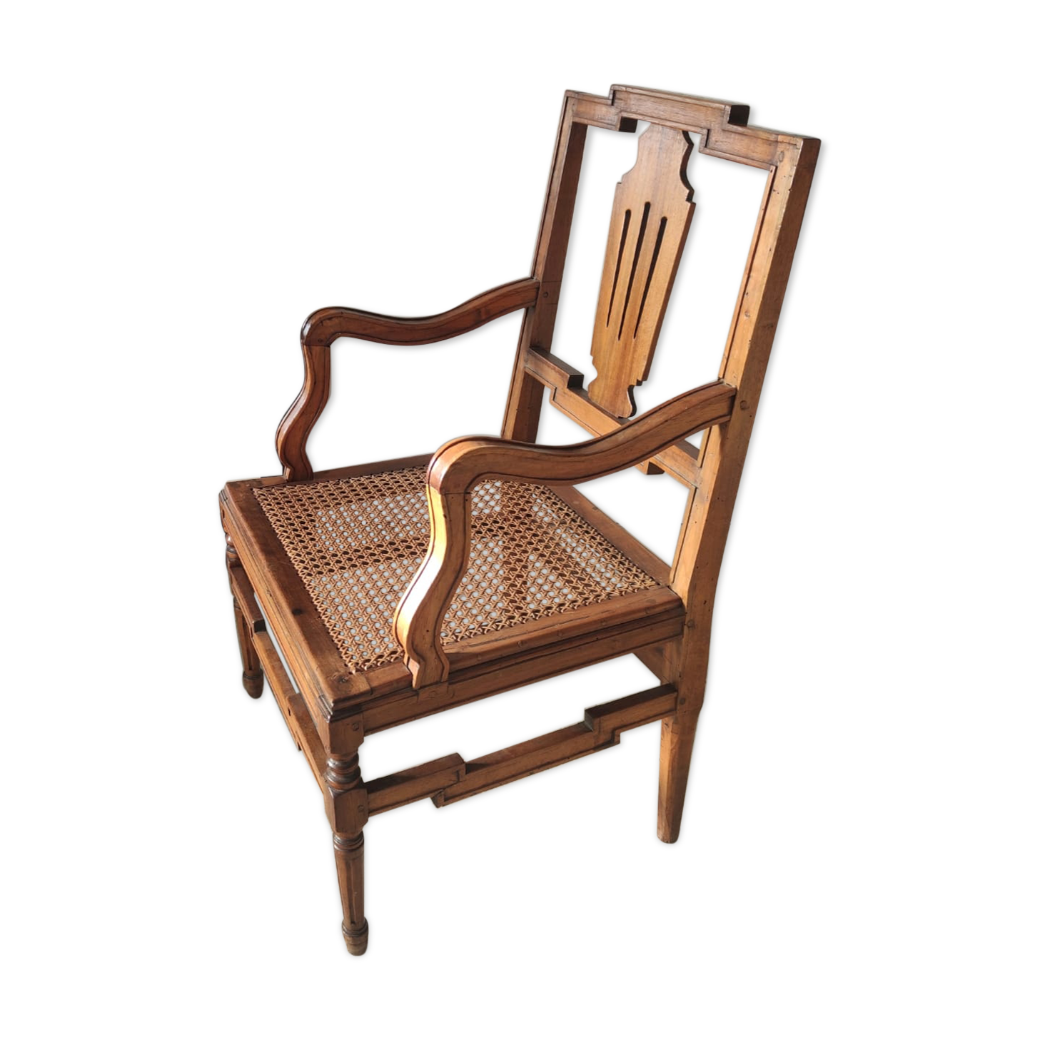 Armchair canned in natural wood