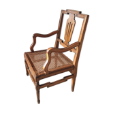 Armchair canned in natural wood