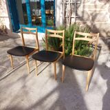 5 Scandinavian style chairs, wood and black faux leather.