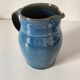 Blue glazed stoneware jug