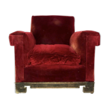 Red armchair with decorated base