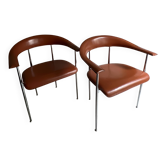 Set of 2 Fasem P40 chairs in cognac leather.