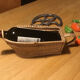 Old wicker bottle holder