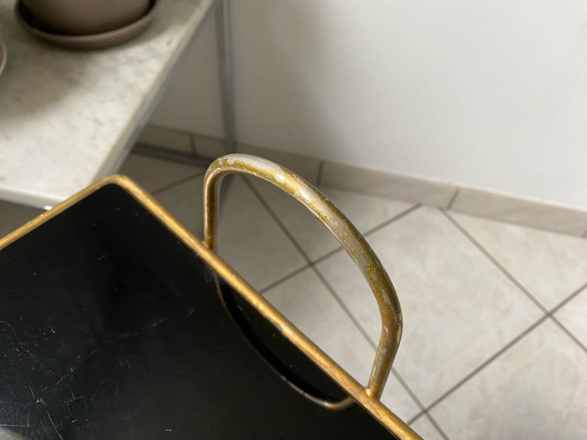 Vintage 1960s brass and smoked glass side table with magazine holder.