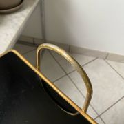 Vintage 1960s brass and smoked glass side table with magazine holder.