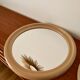 Large round mirror in pink beige plastic from the 70s