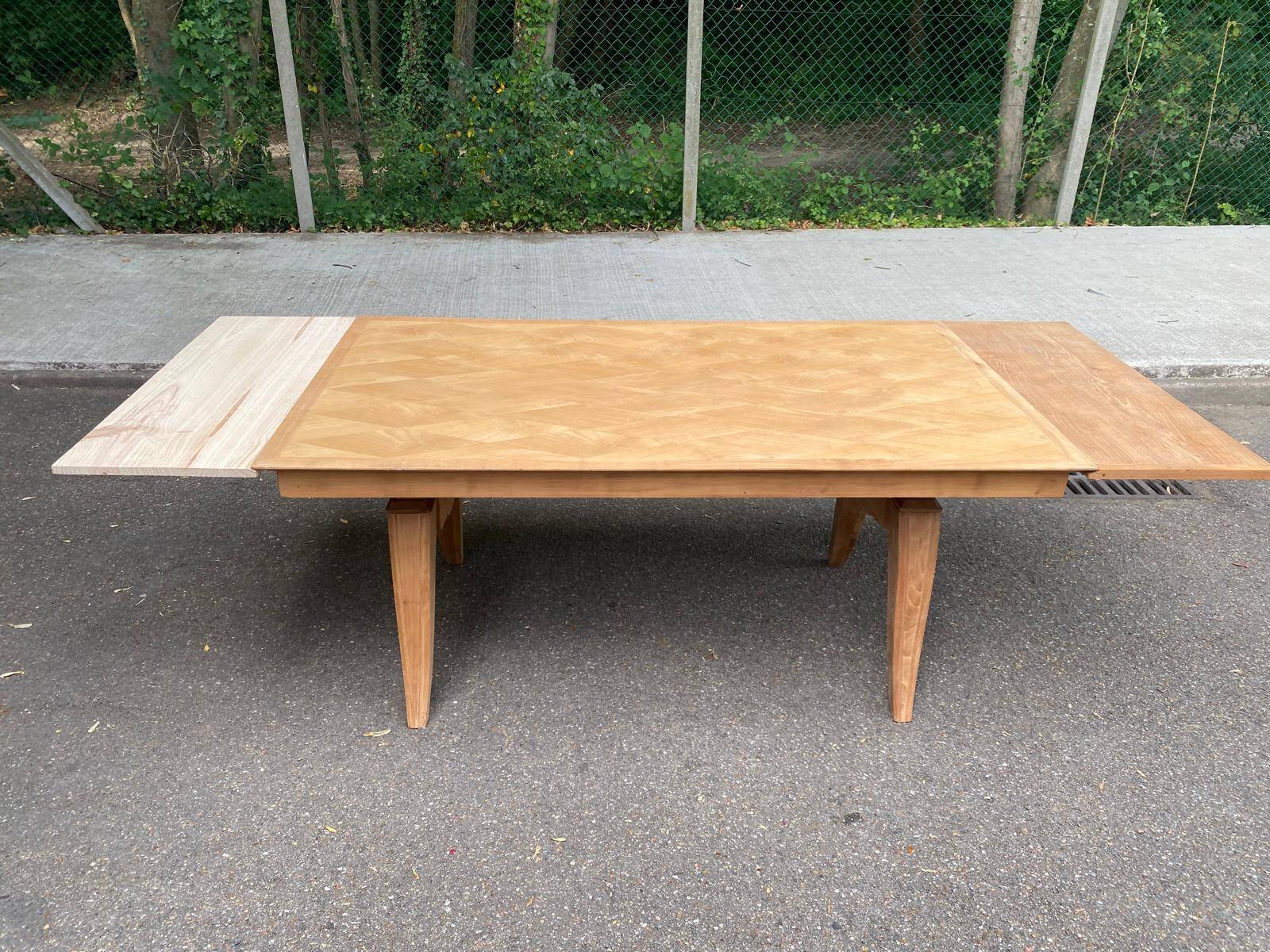 Renovated 1950s wooden Art Deco extendable dining table.