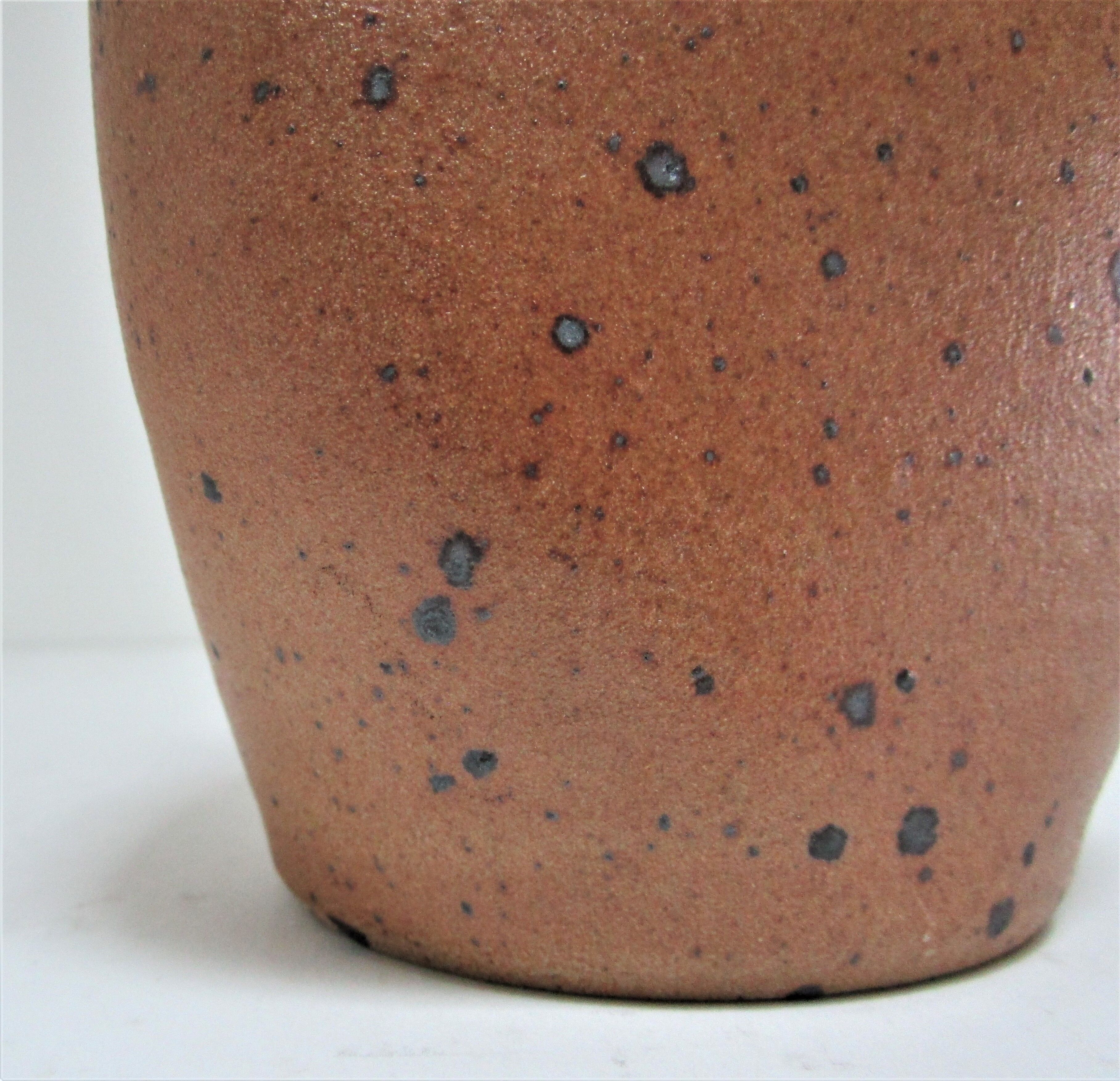 Soliflore vase in pyrite sandstone with three vintage faces