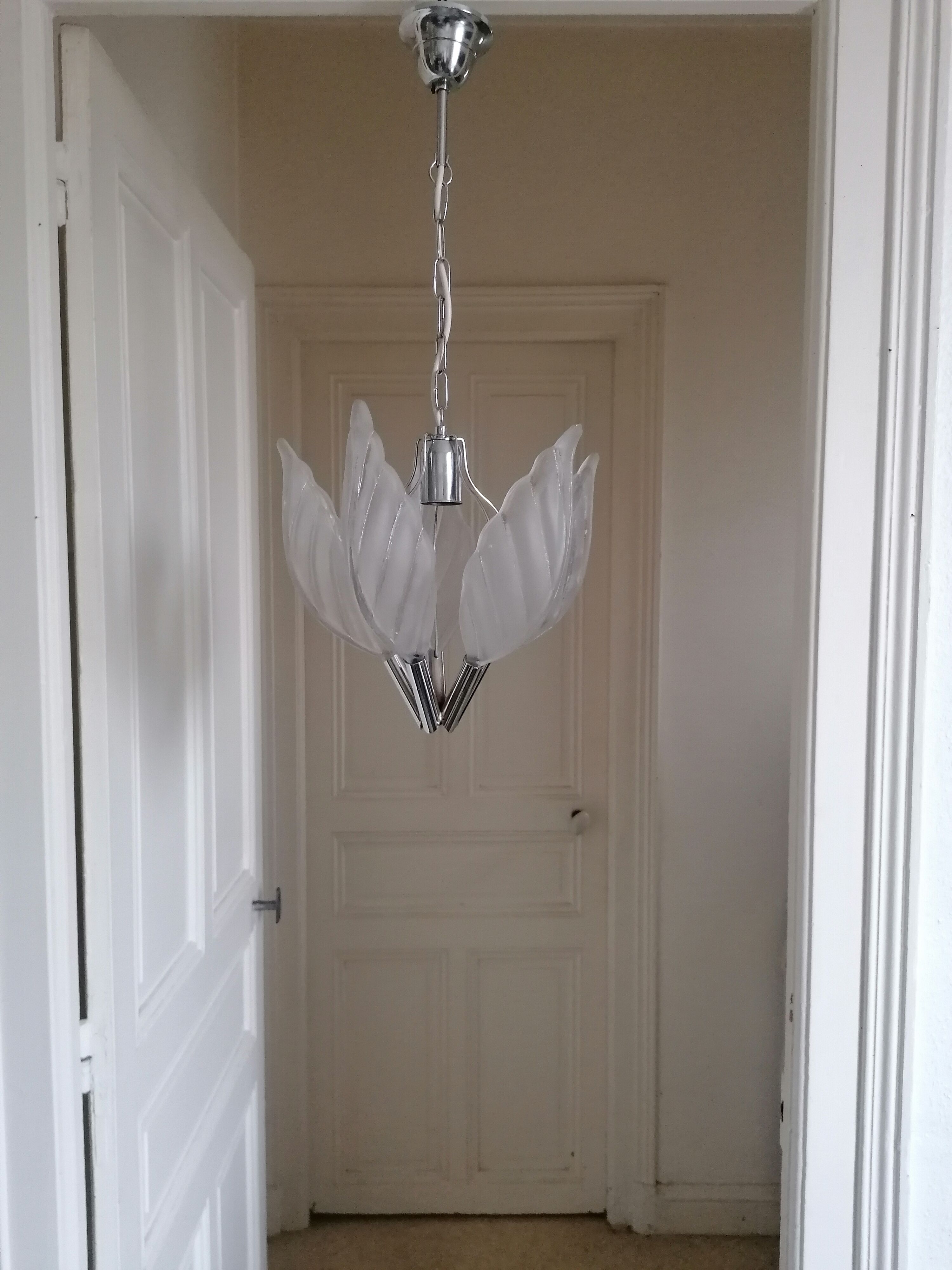Chrome metal chandelier and glass plate