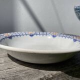 Round, shallow ceramic salad bowl from Saint Amand