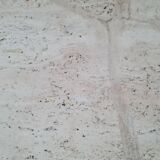 Pair of travertine nesting tables