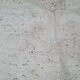 Pair of travertine nesting tables