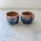 Set of artisanal pitcher and weathered cups