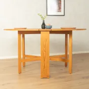 Practical folding table from the 1980s made of light brown pine wood