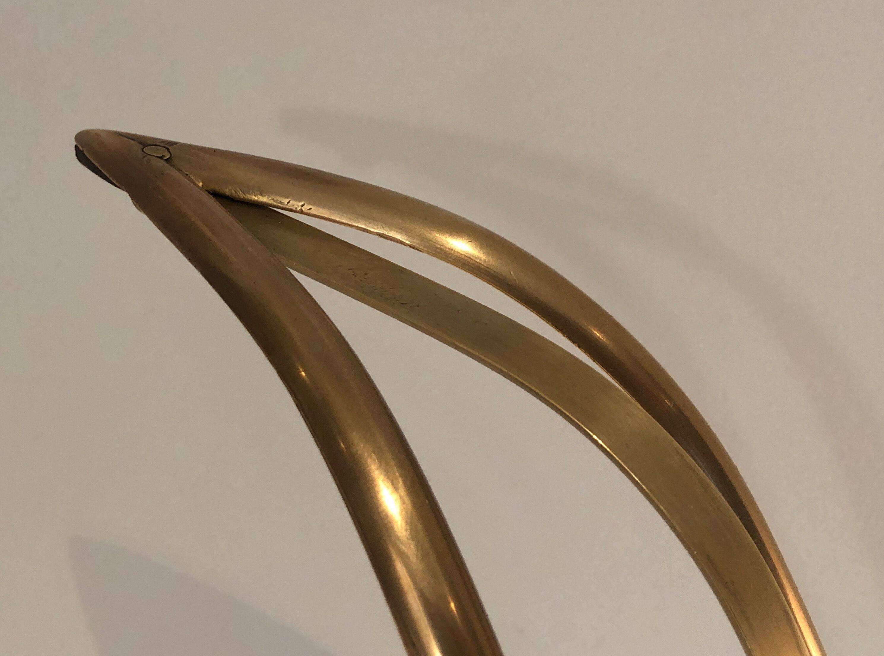 Brass swan magazine rack