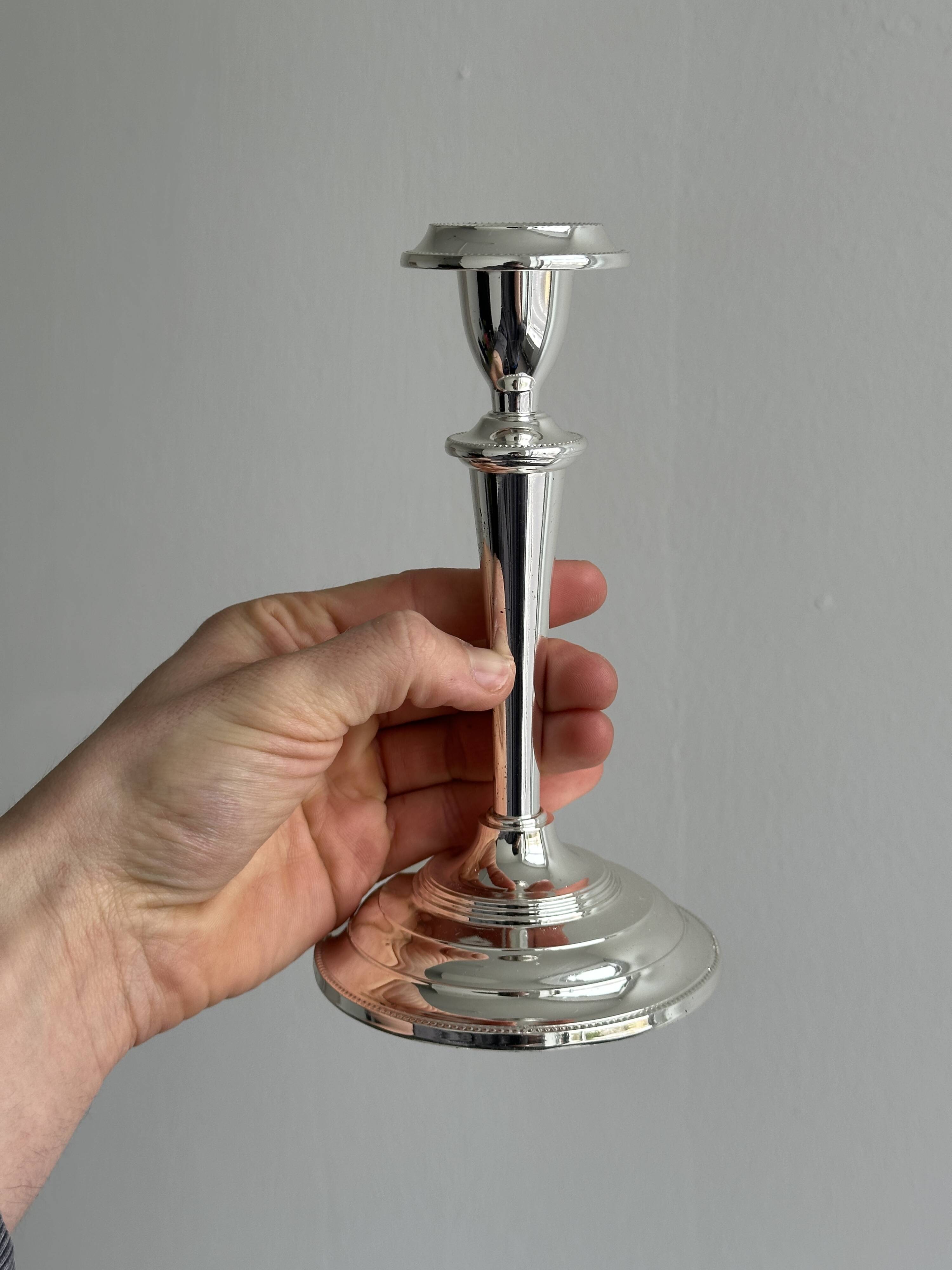 Pair of elegant stainless steel candlesticks