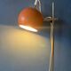 Mid-Century orange floor lamp with "eyeball" shade