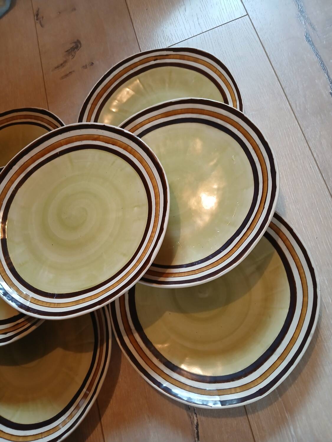 7 old stoneware flat plates