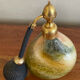 Flacon parfum avec poire