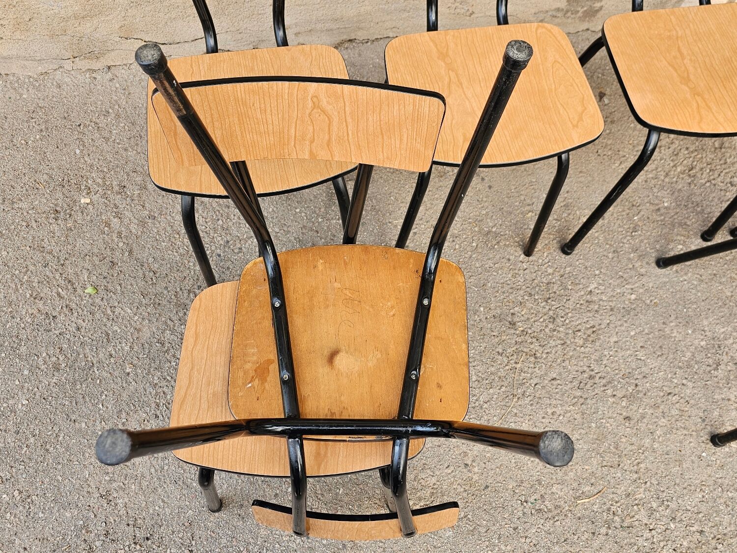 Chairs in black and light brown formica