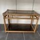 Vintage 1950s rattan and glass TV storage unit.