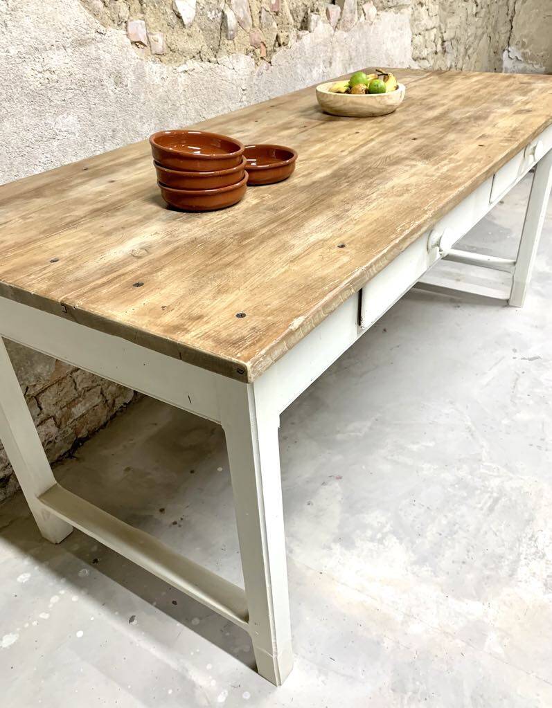 Farm table with off-white legs.