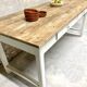 Farm table with off-white legs.