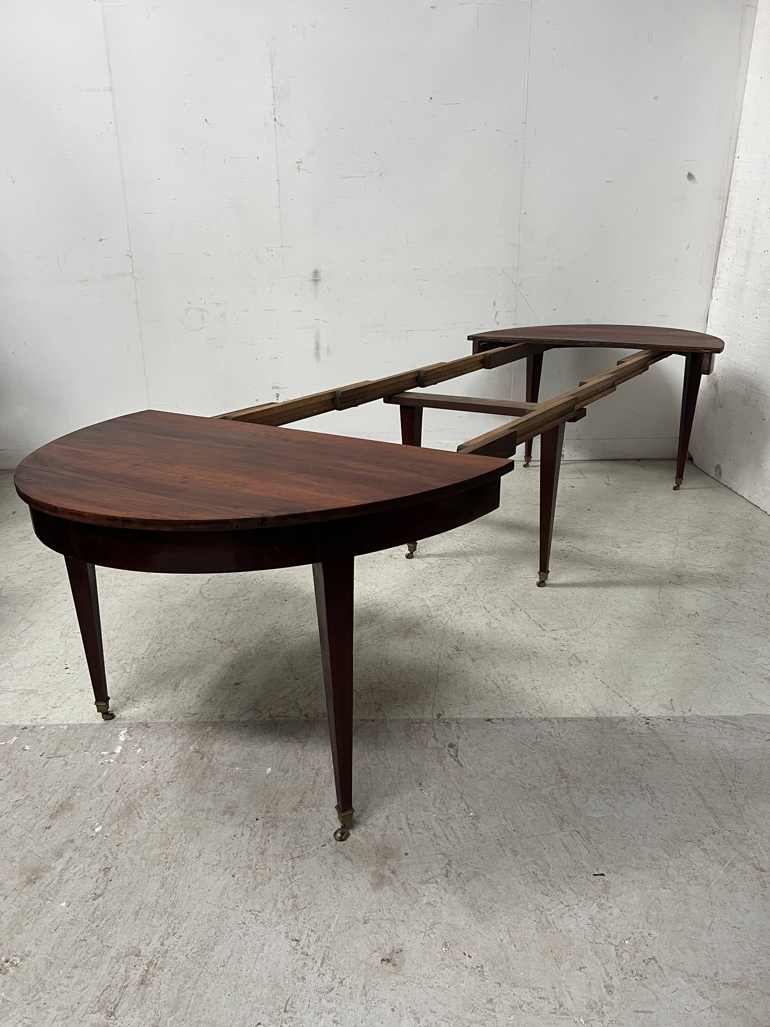 Louis XVI style bandeau table with 6 XIX century tapered legs.