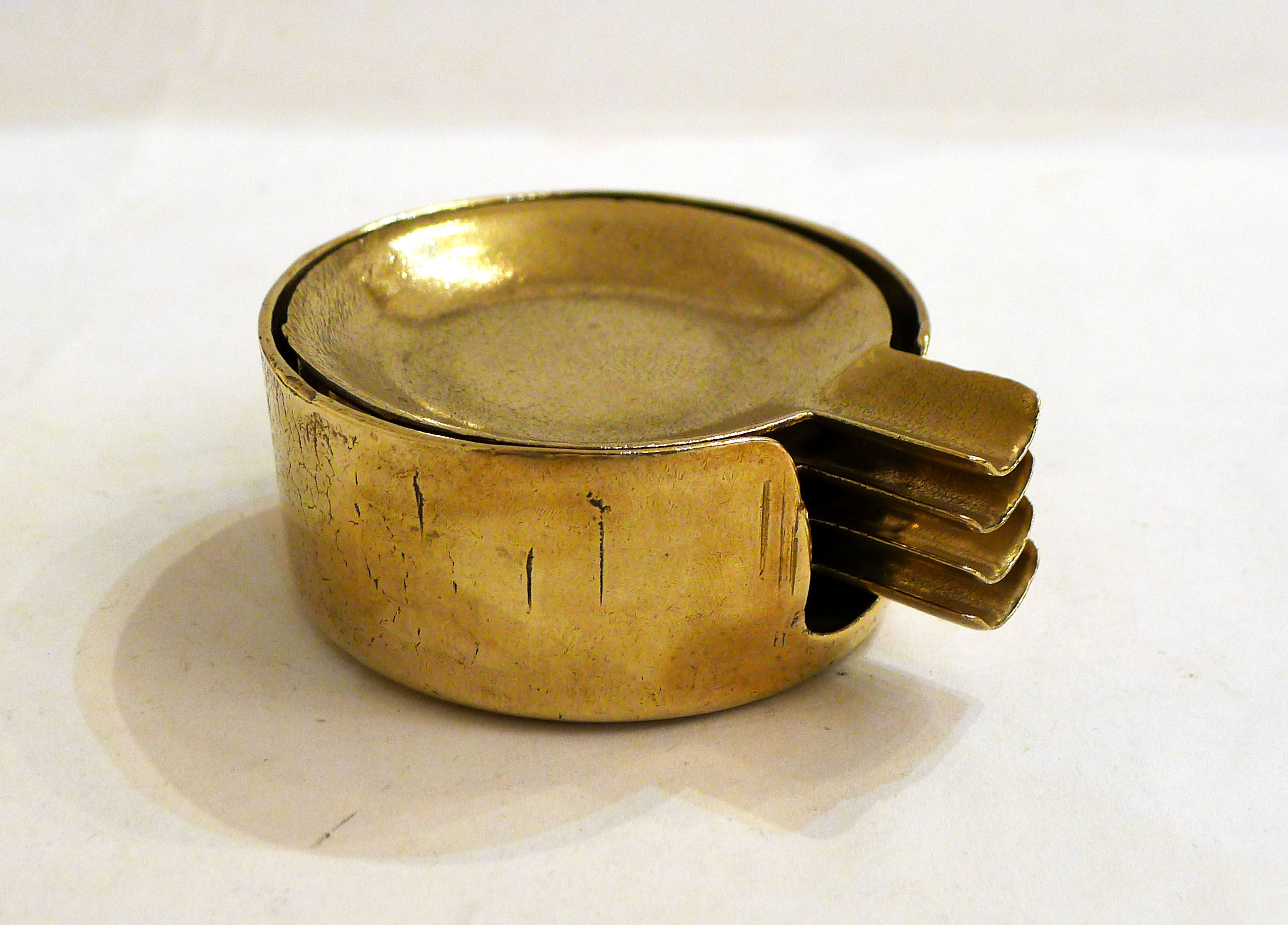 Set of 4 brass stackable ashtrays