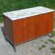 Florence Knoll buffet in wood and marble with chrome legs from the 1970s.