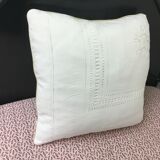 White cushion embroidered old linen