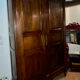 Armoire penderie en acajou montants cannelés . Style Louis 16