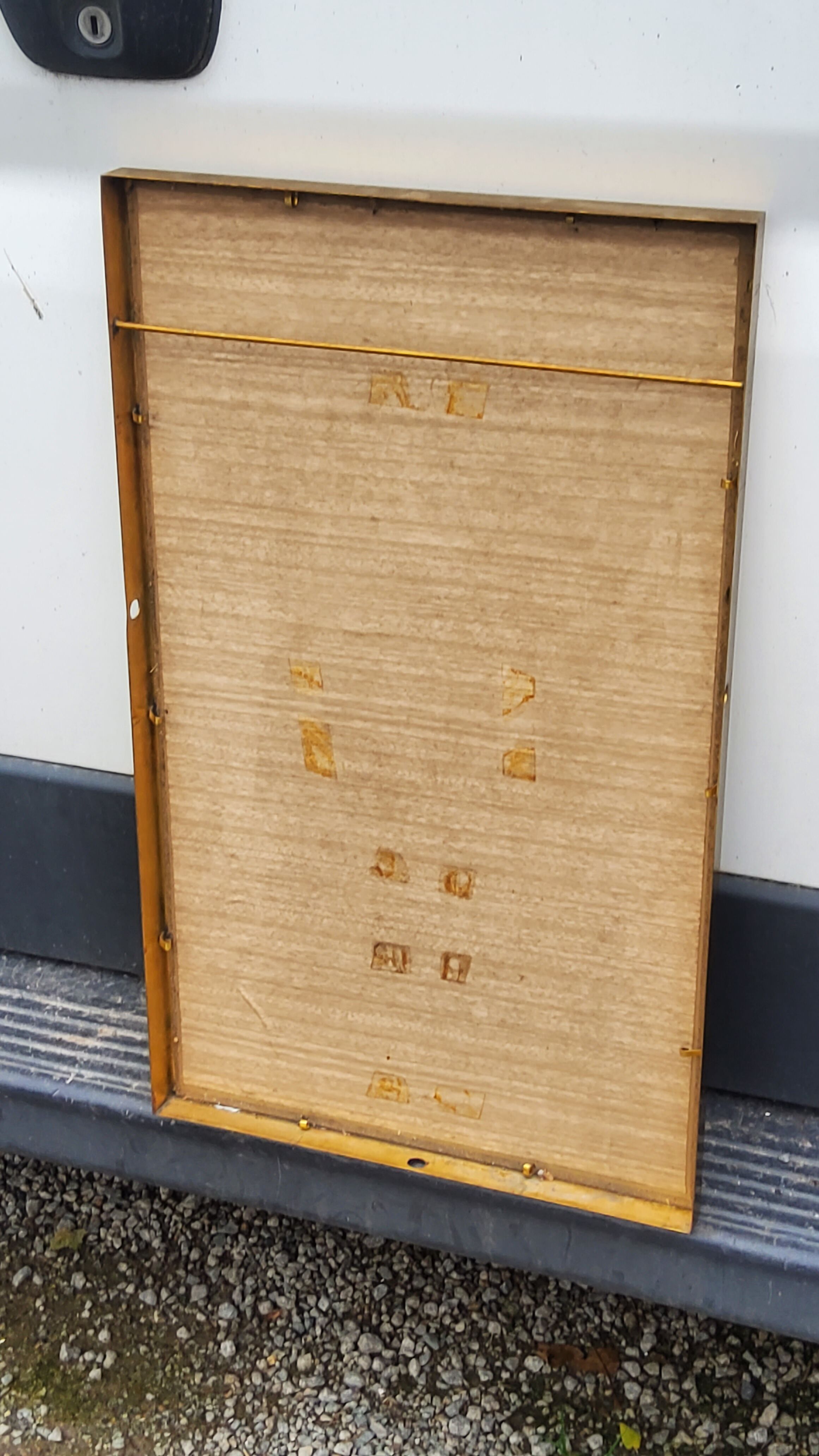 Mirror of the 70s in gilded metal, 60x35 cm