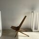 Foldable designer armchair in wooden slats