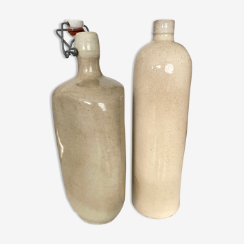 Set of 2 enamelled sandstone bottles