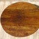 Walnut drop-leaf table with honey spoon legs.
