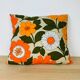 Coussin fleurs années 70 vintage