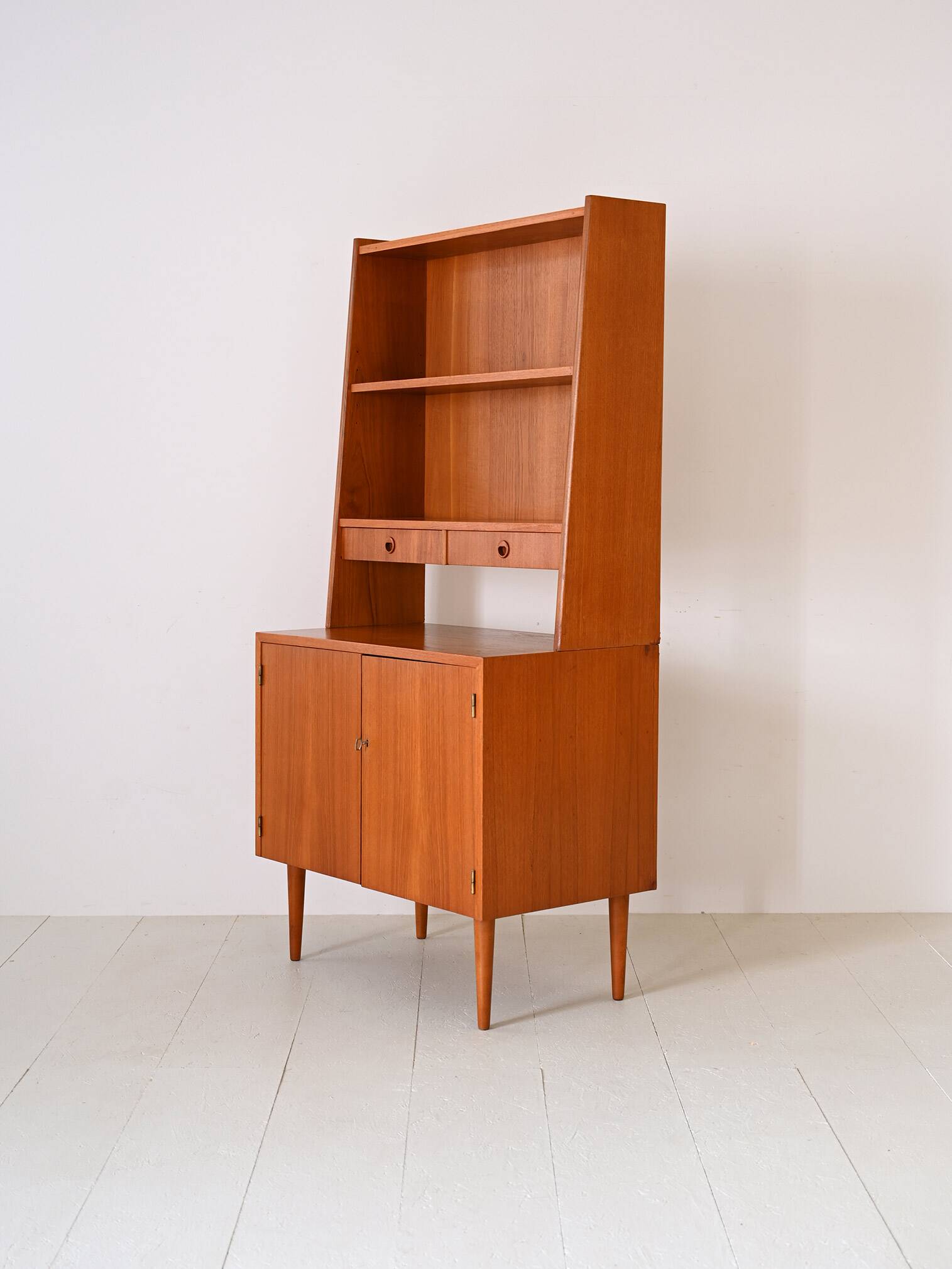 Bookcase with drawers and storage compartment