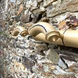 Antique wall-mounted coat rack in turned bamboo-style wood, 1930s-40s